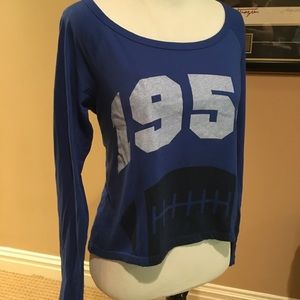 Fun casual 1954 football top. High front, low back
